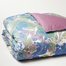 An abstract print in pretty pastels lends modern style to this duvet cover from Edmond Frette. An abstract print in pretty pastels lends modern style to this duvet cover from Edmond Frette.