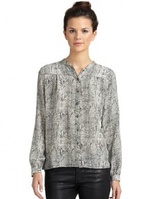 THE LOOKAllover contrasting animal printButton-frontLong sleeves with barrel cuffsTHE FITAbout 24 from shoulder to hemTHE MATERIALSilkCARE & ORIGINDry cleanMade in USAModel shown is 5'9 (175cm) wearing US size Small. THE LOOKAllover contrasting animal printButton-frontLong sleeves with barrel cuffsTHE FITAbout 24 from shoulder to hemTHE MATERIALSilkCARE & ORIGINDry cleanMade in USAModel shown is 5'9 (175cm) wearing US size Small.