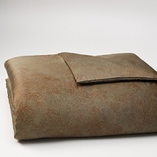 Abstracted paisley motifs in rust, aqua, olive, and aubergine are loosely collaged on a camel ground. Duvet has hidden button closure. Duvets, shams and comforters are self reversing. Coordinates with the Corrugated Stripe Sheets in Camel or the Pearl Edge Solid Sateen Sheets in Bear. Also coordinates with the Chenille Dash Blanket in Bear. Abstracted paisley motifs in rust, aqua, olive, and aubergine are loosely collaged on a camel ground. Duvet has hidden button closure. Duvets, shams and comforters are self reversing. Coordinates with the Corrugated Stripe Sheets in Camel or the Pearl Edge Solid Sateen Sheets in Bear. Also coordinates with the Chenille Dash Blanket in Bear.