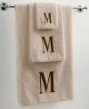 Dry off in your signature style with monogrammed towels from Avanti. Embroidered with a single capital letter in Bodoni font, this combed cotton fingertip towel makes it easy to personalize your bath.
