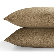 Delicate tree saplings in bronze, gold and umber tones are printed on a twill background on duvets, comforters, and shams in this organic, earthy bedding collection from Calvin Klein Home. A small printed leaf pattern in complementary hues accents sheets and pillowcases. Delicate tree saplings in bronze, gold and umber tones are printed on a twill background on duvets, comforters, and shams in this organic, earthy bedding collection from Calvin Klein Home. A small printed leaf pattern in complementary hues accents sheets and pillowcases.
