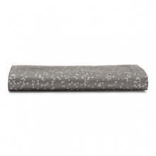 Tiny light grey blossoms and stems adorn these soft, nature-inspired sheets by Calvin Klein Home. Tiny light grey blossoms and stems adorn these soft, nature-inspired sheets by Calvin Klein Home.