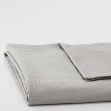 Calm, cool and collected - Calvin Klein's earth tones and whimsical pattern create a stunning collection. This blanket is quilt with topstitching throughout. Calm, cool and collected - Calvin Klein's earth tones and whimsical pattern create a stunning collection. This blanket is quilt with topstitching throughout.