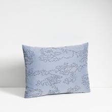 Freshly painted flowers in tones of blue fall on a textured ground. Duvet has a hidden button closure. Duvets and shams are self reversing. Freshly painted flowers in tones of blue fall on a textured ground. Duvet has a hidden button closure. Duvets and shams are self reversing.