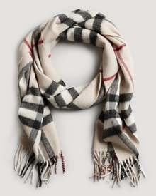 Stay warm in style with this luxe cashmere scarf from Burberry. Stay warm in style with this luxe cashmere scarf from Burberry.