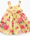 A pocket full of sunshine. She'll brighten up any day in this darling floral-print dress from Blueberi Boulevard.