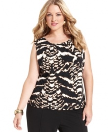 Calvin Klein's bold take on animal print dresses up this plus size shell. Pair it with suit separates for a ready-made work look. Calvin Klein's bold take on animal print dresses up this plus size shell. Pair it with suit separates for a ready-made work look.