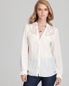 Exude vintage elegance in this seriously romantic GUESS blouse flaunting a delicate lace yoke.