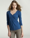 An elegantly twisted neckline elevates this Velvet by Graham & Spencer top.