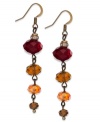 Turn the calendar toward fall with c.A.K.e. by Ali Khan's linear set of drop earrings. The pair is crafted from gold tone mixed metal and features an array of glass stones. Approximate drop: 2 inches.