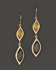 Pavé diamonds frame faceted smoky quartz and orange citrine gems, set in 18K gold leaves. By Carelle. Pavé diamonds frame faceted smoky quartz and orange citrine gems, set in 18K gold leaves. By Carelle.
