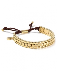 This Michael Kors watch band takes its cues from the jewel box, crafted of gold-tone plate with an adjustable bar closure. This Michael Kors watch band takes its cues from the jewel box, crafted of gold-tone plate with an adjustable bar closure.