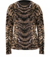 Contemporary knitwear gets a wild edge in Roberto Cavallis tiger print pullover, detailed in an ultra luxe blend of wool, mohair and angora for a chic, cozy finish - Rounded neckline, long sleeves, dropped shoulders, lined back - Flared silhouette, fitted at the top - Team with edgy separates and a streamlined statement handbag