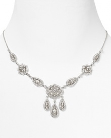 Nadri's crystal-clad collar flaunts shimmering floral stations. Pair the luxe statement-maker with a vibrant cocktail frock and grab attention after hours. Nadri's crystal-clad collar flaunts shimmering floral stations. Pair the luxe statement-maker with a vibrant cocktail frock and grab attention after hours.