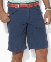 A button-flap cargo pocket at the leg lends rugged appeal to a preppy short in comfortable cotton poplin.