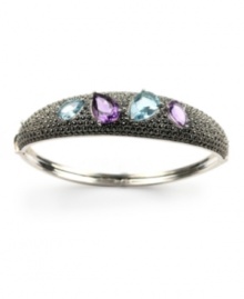 Frost yourself in a palette of pastels. Judith Jack bangle features a trendy design highlighting pear-cut blue topaz (5-1/2 ct. t.w.) and amethyst (3-5/8 ct. t.w.). Setting crafted in sterling silver with sparkling marcasite accents. Approximate diameter: 2-1/2 inches. Frost yourself in a palette of pastels. Judith Jack bangle features a trendy design highlighting pear-cut blue topaz (5-1/2 ct. t.w.) and amethyst (3-5/8 ct. t.w.). Setting crafted in sterling silver with sparkling marcasite accents. Approximate diameter: 2-1/2 inches.