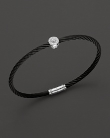 From the Celtic Noir Collection, a stackable bangle in white gold and black PVD cable with diamond stations. Designed by Charriol. From the Celtic Noir Collection, a stackable bangle in white gold and black PVD cable with diamond stations. Designed by Charriol.