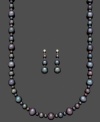 Exotic shimmer. This unique jewelry set features a matching strand necklace and pair of drop earrings. Crafted from black cultured freshwater pearls (4-10 mm) and a sterling silver setting. Approximate length: 18 inches. Approximate drop: 1-1/2 inches.