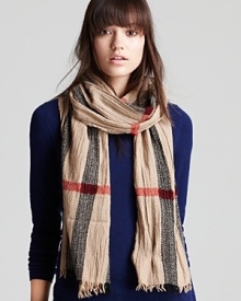 Burberry perfection: wrap up your look in this gauzy scarf with a stand-out, oversized take on signature plaid. It's an instant, cutting-edge classic. Burberry perfection: wrap up your look in this gauzy scarf with a stand-out, oversized take on signature plaid. It's an instant, cutting-edge classic.