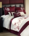 Romantic blossoms bloom upon a soothing white ground in this Haiku comforter set, featuring detailed embroidery and a deep red hue for a look of distinction. A solid-colored bedskirt and complementary floral designs on the shams and decorative pillows finish the look for a charming presentation.