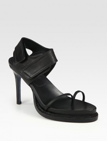 Uplifted by a skinny heel, this leather platform design has comfortable Velcro® straps and a toe ring duo. Stacked heel, 4 (100mm)Covered platform, 1 (25mm)Compares to a 3 heel (75mm)Leather upperLeather lining and solePadded insoleMade in ItalyOUR FIT MODEL RECOMMENDS ordering one half size up as this style runs small. Uplifted by a skinny heel, this leather platform design has comfortable Velcro® straps and a toe ring duo. Stacked heel, 4 (100mm)Covered platform, 1 (25mm)Compares to a 3 heel (75mm)Leather upperLeather lining and solePadded insoleMade in ItalyOUR FIT MODEL RECOMMENDS ordering one half size up as this style runs small.