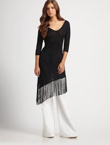 A nostalgic-yet-fashion-forward nod to Western styling, this design offers movement, sophistication and a flattering silhouette. Plunge v-neckThree-quarter sleevesPull-on styleAsymmetrical fringe hemAbout 24 from natural waistMulberry silkImportedDry clean Model shown is 5'9½ (176cm) wearing US size Small. A nostalgic-yet-fashion-forward nod to Western styling, this design offers movement, sophistication and a flattering silhouette. Plunge v-neckThree-quarter sleevesPull-on styleAsymmetrical fringe hemAbout 24 from natural waistMulberry silkImportedDry clean Model shown is 5'9½ (176cm) wearing US size Small.