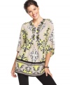 Rhinestones add a dressy appeal to this boldly printed Alfani tunic -- perfect over leggings or skinny jeans!