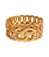 Ultra-luxe golden 1996 double C row bangle - This statement-making bracelet is authentic vintage Chanel from 1996 - Stylish gold-plated bracelet with two rows of interlocking circles and the iconic double C Chanel logo affixed on front - Amp up any outfit with this ultra-chic accessory - Perfect for cocktail attire or to dress up daywear