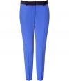 Stylish pants in fine, pure royal blue silk - Soft, ultra-lightweight fabric has an elegant matte sheen - On-trend slim silhouette crops at ankles - Crease detail from hip to hem flatters and elongates the leg - Slash pockets at sides, welt pockets at rear - Contrast decorative banded waist with belt loops - Polished and chic, great for work or play - Pair with an oversize t-shirt and cardigan or billowy blouse