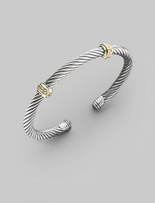 From the Thoroughbred Collection. A signature Yurman sterling silver cable, richly adorned with two textured bands of 14k gold. Sterling silver & 14k yellow gold Cable, 5mm Diameter, about 2¼ Made in USA From the Thoroughbred Collection. A signature Yurman sterling silver cable, richly adorned with two textured bands of 14k gold. Sterling silver & 14k yellow gold Cable, 5mm Diameter, about 2¼ Made in USA