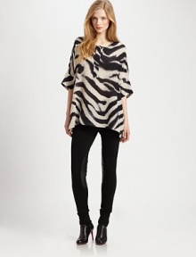 The quintessential combination of wild style and classic luxury, this boxy, animal-print top made from fine silk is the ultimate wardrobe must-have.Round neckElbow-length sleevesButton placketRelaxed fitAllover printPull-on styleAbout 27 from shoulder to hemSilkDry cleanImported Model shown is 5'9½ (176cm) wearing US size Small. The quintessential combination of wild style and classic luxury, this boxy, animal-print top made from fine silk is the ultimate wardrobe must-have.Round neckElbow-length sleevesButton placketRelaxed fitAllover printPull-on styleAbout 27 from shoulder to hemSilkDry cleanImported Model shown is 5'9½ (176cm) wearing US size Small.