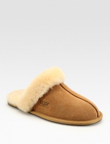 Shearling lining and trim create the ultimate in casual luxury. Round-toe design Leather sole Imported Fur origin: Australia Shearling lining and trim create the ultimate in casual luxury. Round-toe design Leather sole Imported Fur origin: Australia