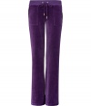 Off-duty looks get an effortless cool edge with Juicy Coutures bootcut velour lounge pants - Drawstring waistline, flared leg, sits low on the hips - Figure-hugging fit - Style with a tee and cozy pullover, or for a sportier look, with a matching hoodie and flats