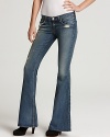 Vintage inspired style arrives on the scene with distressed details courtesy for these rag & bone/JEAN flared jeans in a low-rise silhouette. Work the look with your best boots and tissue-soft tee for a retro cool reprise.