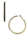 kate spade new york's ridged enamel and gold-plated hoops will make a bold addition to your jewel box. Slip them in to dress up denim or round out a cocktail look.