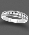 Striking style. Sparkling round-cut diamond (1/2 ct. t.w.) lie in a row in an etched setting of 14k white gold.