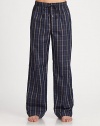 Woven pant features classic styling and modern, eye-catching check pattern.Elastic drawstring waistInseam, about 32CottonMachine washImported