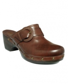 Down to earth: Rustic details--a wooden heel, buckle hardware and gold studs--add an earthy aesthetic to Clarks' Teak Willow clogs. Whether you wear them in the country or on the town, they're a classic, comfortable footwear option. Down to earth: Rustic details--a wooden heel, buckle hardware and gold studs--add an earthy aesthetic to Clarks' Teak Willow clogs. Whether you wear them in the country or on the town, they're a classic, comfortable footwear option.