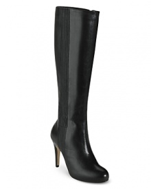 Sleek and shapely, these leather boots from Cole Haan get a dose of sleek comfort from side goring and concealed NIKE AIR technology. Sleek and shapely, these leather boots from Cole Haan get a dose of sleek comfort from side goring and concealed NIKE AIR technology.