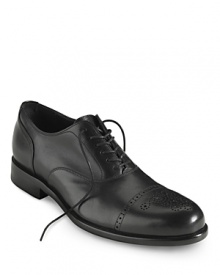 From Cole Haan, the medallion cap toe oxford with a rich leather upper, leather linings and concealed Nike Air™ Technology. From Cole Haan, the medallion cap toe oxford with a rich leather upper, leather linings and concealed Nike Air™ Technology.