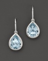 Bring a little clarity to your look. A beautiful faceted teardrop blue topaz earring in 14 Kt. white gold with diamond accents.