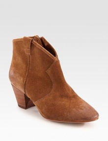 Finished with an exposed side zipper, intricate stitching and a low-cut vamp add Western inspiration to this suede ankle boot. Stacked heel, 2½ (65mm)Suede upperSide zipperLeather lining and solePadded insoleImported Finished with an exposed side zipper, intricate stitching and a low-cut vamp add Western inspiration to this suede ankle boot. Stacked heel, 2½ (65mm)Suede upperSide zipperLeather lining and solePadded insoleImported
