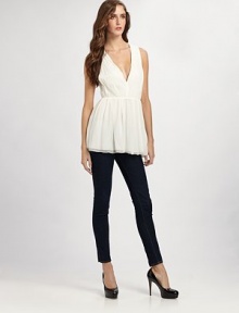 Breezy and oh-so-feminine, this silk topper crosses in the back for a subtle skin-baring reveal.V necklineSleevelessEmpire waistGathered from waist to hemCriss-cross backAbout 30 from shoulder to hemSilkDry cleanImported Breezy and oh-so-feminine, this silk topper crosses in the back for a subtle skin-baring reveal.V necklineSleevelessEmpire waistGathered from waist to hemCriss-cross backAbout 30 from shoulder to hemSilkDry cleanImported