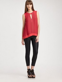 Sultry cutouts, cap sleeves and a lengthy silhouette update this fluid chiffon top. CrewneckFront cutout detailCap sleevesBack keyhole closureLonger length hits below the hipsPolyester chiffonDry cleanMade in USA of imported fabricModel shown is 5'10 (177cm) wearing US size Small. Sultry cutouts, cap sleeves and a lengthy silhouette update this fluid chiffon top. CrewneckFront cutout detailCap sleevesBack keyhole closureLonger length hits below the hipsPolyester chiffonDry cleanMade in USA of imported fabricModel shown is 5'10 (177cm) wearing US size Small.