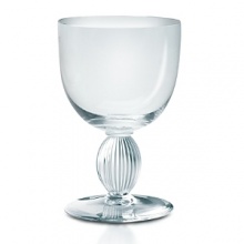 Detailed with Lalique's signature touch - a swirl of frosted glass on the stem. Shown from left to right: carafe, pitcher, flute, goblet, wine glass, small wine glass. Detailed with Lalique's signature touch - a swirl of frosted glass on the stem. Shown from left to right: carafe, pitcher, flute, goblet, wine glass, small wine glass.