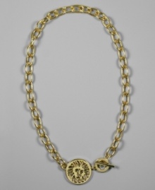 An etched lion medallion blazes with beauty on this confident necklace by AK Anne Klein. Crafted in goldtone mixed metal. Approximate length: 17 inches. An etched lion medallion blazes with beauty on this confident necklace by AK Anne Klein. Crafted in goldtone mixed metal. Approximate length: 17 inches.
