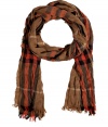 A modern take on the classic tartan scarf, this urbane-cool accessory provides warmth and effortless style - Classic tartan print, easy to style length, frayed edges - Wear with straight leg jeans, a cashmere pullover, and a classic trench