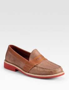 A traditional loafer style is redefined by its contrasts in finely textured leather.Leather upperLeather liningPadded insoleRubber soleImported A traditional loafer style is redefined by its contrasts in finely textured leather.Leather upperLeather liningPadded insoleRubber soleImported