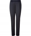 Jil Sanders navy virgin wool pants are an artfully crafted example of elegant, precision tailoring - Medium-rise, slim cut style with a touch of stretch - Banded waist and side zip - Crease detail flatters and elongates the leg - Pant tapers and crops at ankles with a sleek vent - Polished and effortlessly chic, perfect for pairing with button downs or pullovers and ballet flats or pumps