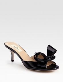 Couture-inspired patent leather slide with an oversized bow adornment and kitten heel. Self-covered heel, 2 (50mm)Patent leather upperLeather lining and solePadded insoleMade in ItalyOUR FIT MODEL RECOMMENDS ordering one half size up as this style runs small. Couture-inspired patent leather slide with an oversized bow adornment and kitten heel. Self-covered heel, 2 (50mm)Patent leather upperLeather lining and solePadded insoleMade in ItalyOUR FIT MODEL RECOMMENDS ordering one half size up as this style runs small.